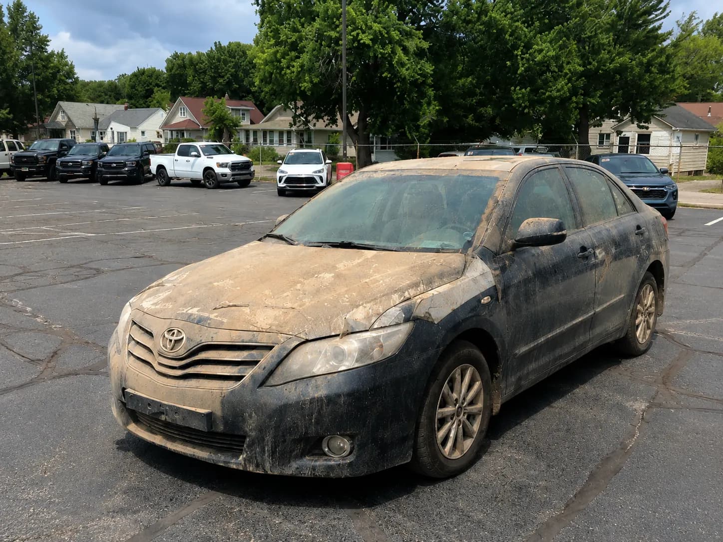 Vehicle with dirt and blemishes in frame
